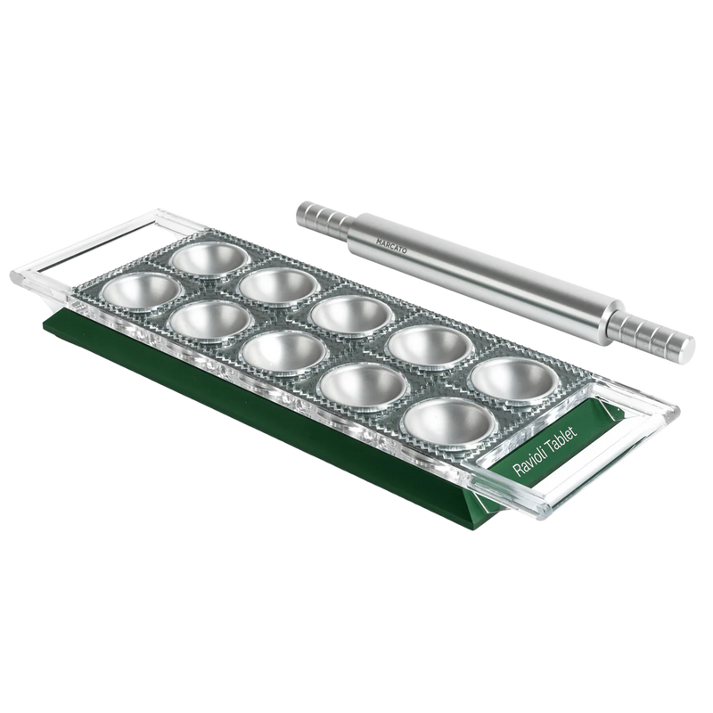 Marcato Ravioli Tablet Pasta Maker showing close-up details of the ravioli cutting and sealing tool, ideal for crafting homemade Italian ravioli.