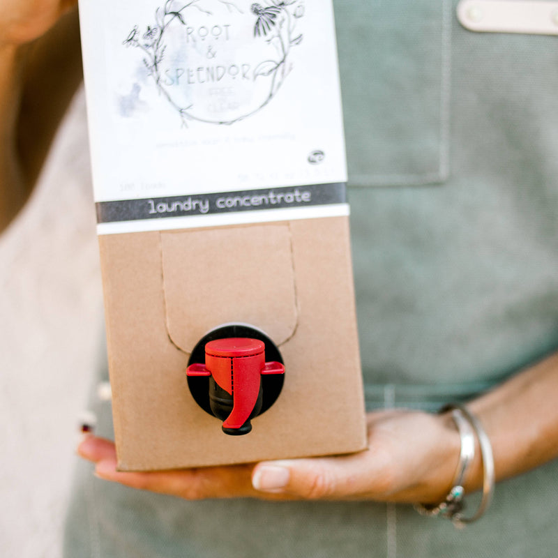 Root & Splendor Laundry Soap Concentrate - Hush - 1.5L box held by a person, highlighting its eco-friendly, ultra-concentrated formula and sustainable packaging.