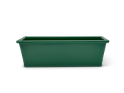 Great Jones | Breadwinner - Raspberry loaf pan with a nonstick, wavy ceramic design, ideal for flawless baking and easy release of bread.