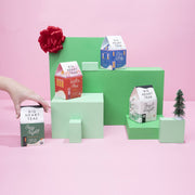 Big Heart Tea Co. - Rosy & Bright 10 ct Tea Bags displayed among mint-green blocks with a festive touch, showcasing its holiday-inspired blend.