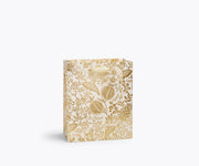 Rifle Paper Co. - Pomegranate Gift Bag: Wine, ivory with gold botanical print, features metallic ribbon handles, and a To and From tag for elegant gifting.