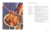 Cookbook spread showing 'Grated Tomato Linguine' recipe from 'By Heart' with an image of linguine in tomato sauce, cheese, and basil, alongside ingredients and instructions.