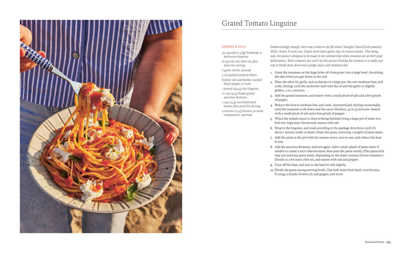 Cookbook spread showing 'Grated Tomato Linguine' recipe from 'By Heart' with an image of linguine in tomato sauce, cheese, and basil, alongside ingredients and instructions.