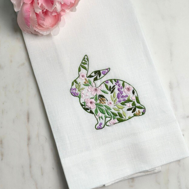 Garden Bunny Towel by Arte Italica & Crown Linen Designs, featuring an embroidered bunny with flowers on a linen towel, perfect for Easter decor or gifting.