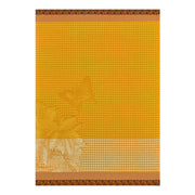 Le Jacquard Français | Jardin Des Papillons Hand Towel features a golden houndstooth pattern with floral and butterfly motifs, framed by brown-gold arcs.
