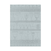 Le Jacquard Français | Cristal Tea Towel, Mist: A decorative linen towel featuring light blue/gray illustrated glassware on shelves with ornamental borders, ideal for drying delicate dishes.