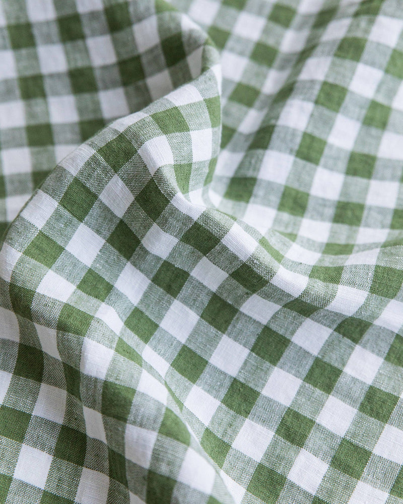 MagicLinen - Linen tablecloth in Forest green gingham, 59x59, featuring a classic checkered pattern, perfect for enhancing your dining table setting.