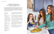 Penguin Random House LLC - The Mediterranean Dish cookbook with a recipe page and a kitchen scene showcasing a woman serving a couscous salad to smiling companions.