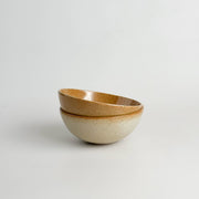 Sarah Kersten - Ramen Bowl: Klamath Wheat, a versatile, ceramic mixing bowl designed for noodles, salads, and more, showcased in a close-up stack on a white surface.