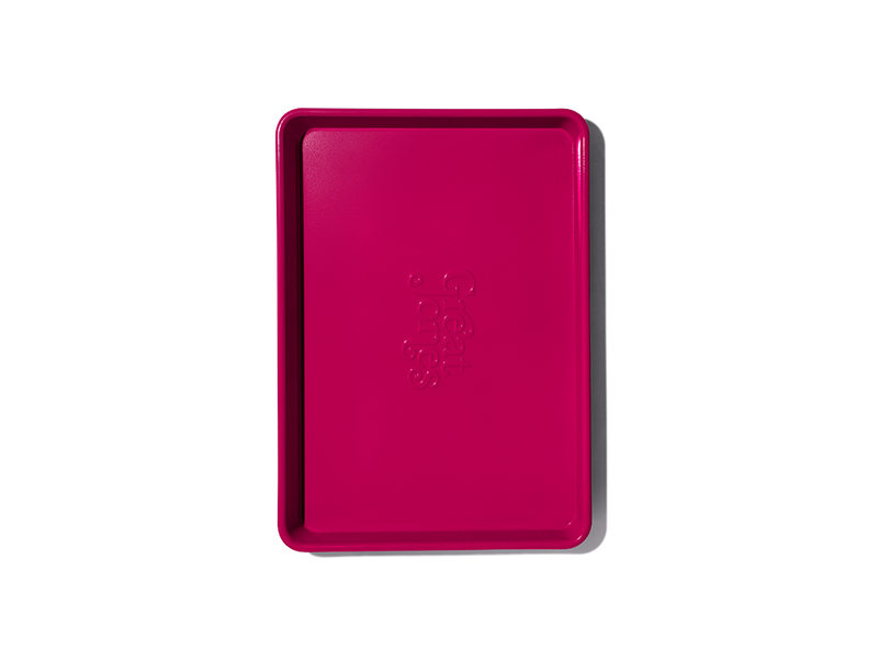 Great Jones | Little Sheet - Pepper: A quarter-sized baking sheet with a nonstick coating, ideal for personal baking or reheating, from Athens Cooks' curated kitchen collection.