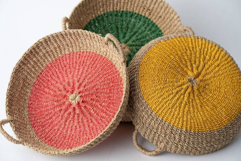 NEEPA HUT - Iris Tray I Yellow, a handwoven seagrass tray with a yellow circle design, ideal for serving or organizing essentials.