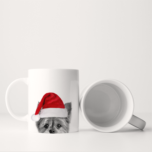 Perkie Prints - Santa Hat Yorkie Mug, featuring a Yorkie in a Santa hat on a white ceramic mug, shown upright and on its side.