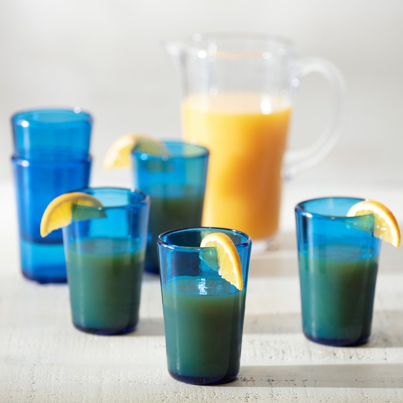Fortessa Veranda HiBall 19oz Sky Blue Tumbler with lemon wedge, showcasing elegant drinkware ideal for stylish kitchen or bar settings.