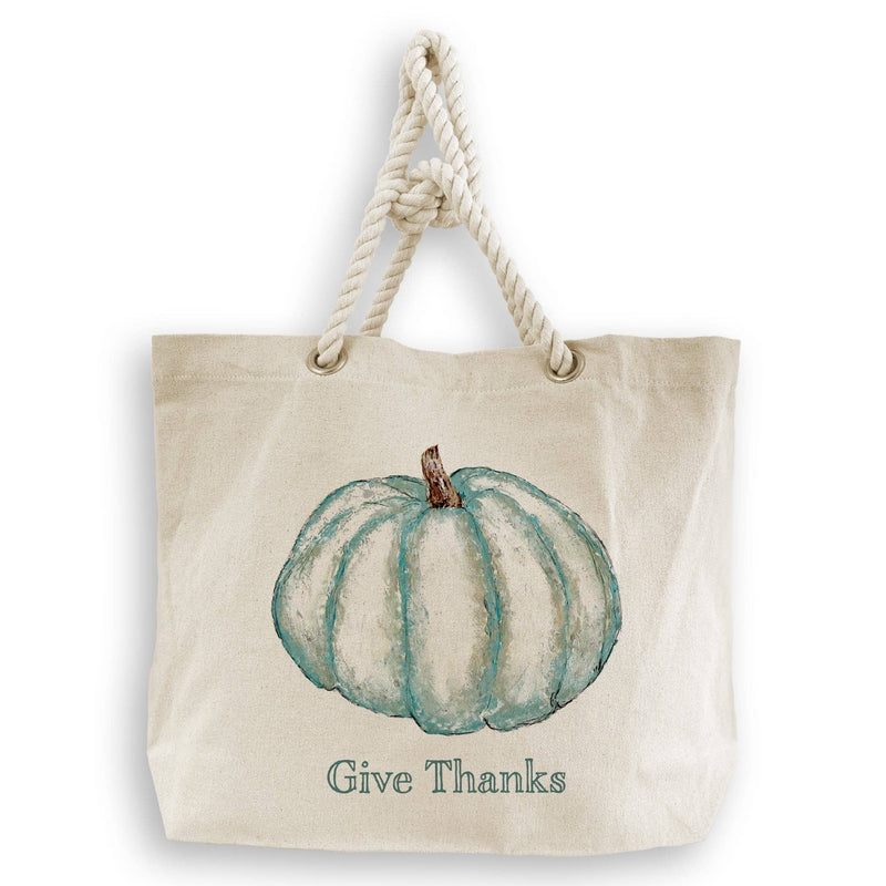 French Graffiti - Blue Pumpkin: Natural tote bag with twisted rope handles, featuring a teal watercolor pumpkin and Give Thanks text, ideal for kitchen-themed gifts.