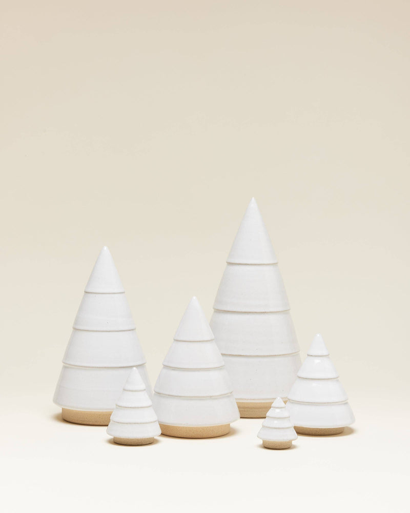 Farmhouse Pottery - Balsam Woodland Trees: Mini, a set of six minimalist, stacked-tier trees made from unglazed clay and white ceramic, perfect for year-round decor.