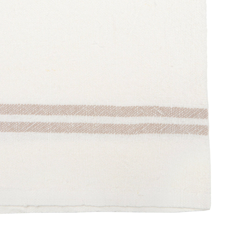 Close-up of Caravan Home's Vintage Linen Ivory & Grey Towels, featuring handmade Khadhi linen with beige stripes, ideal for enhancing rustic or modern dining aesthetics.