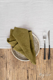 Set of 2 linen napkins with a fork on a table, showcasing premium-quality table decor perfect for enhancing any dining experience.