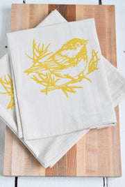 Hearth and Harrow - Set of 4 Organic Cotton Chickadee Cloth Napkins in Yellow, featuring a hand-printed bird design on soft, eco-friendly fabric.