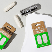 MABLE Silk Dental Floss Refill - 2 Pack: eco-friendly, compostable floss with peppermint flavor, includes two refill spools and a stainless-steel tin for sustainable oral care.