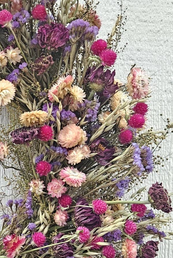 Alissas Flower Farm - Wreath: Pinks and Purples on Sweet Annie, featuring a vibrant floral arrangement with pink strawflowers, gomphrena, purple statice, and zinnias.