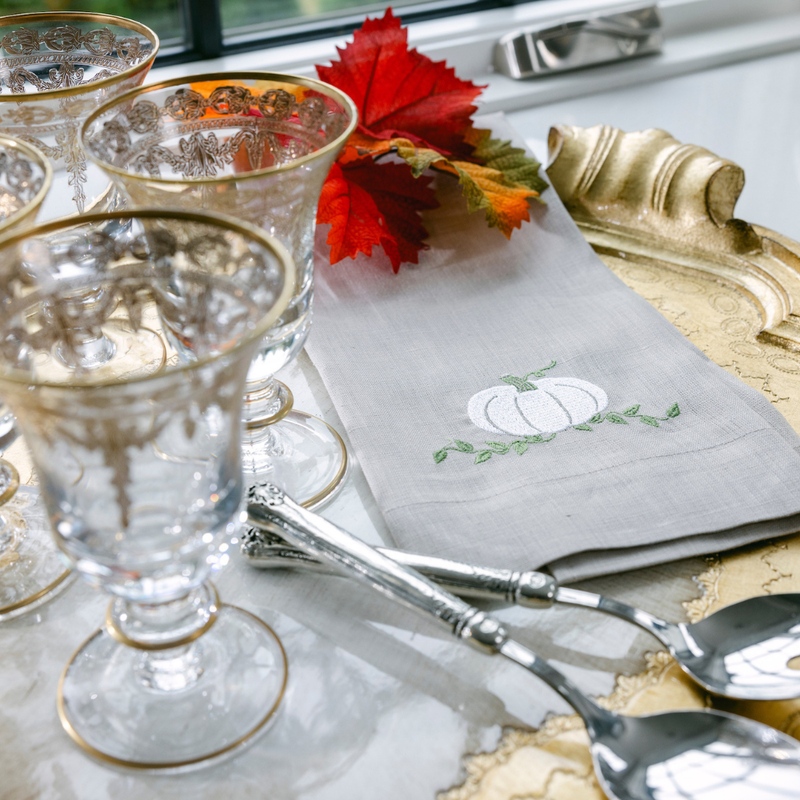 Crown Linen Designs' Pumpkin Linen Towel in Soft Flax, showcasing exquisite European embroidery, enhances kitchen elegance with its versatile design.