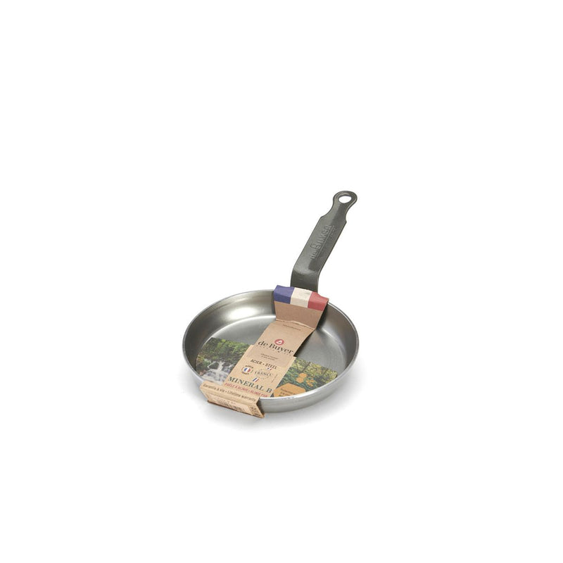 de Buyer | Egg & Pancake Pan, 5.5, featuring a handle and a paper wrap, ideal for making perfect breakfast dishes.