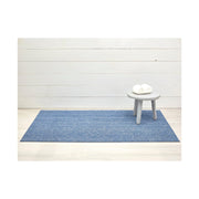 Chilewich Heathered Shag Doormat in Cornflower, featuring a subtle blush tone blend, ideal for indoor/outdoor use with slip-resistant vinyl backing.