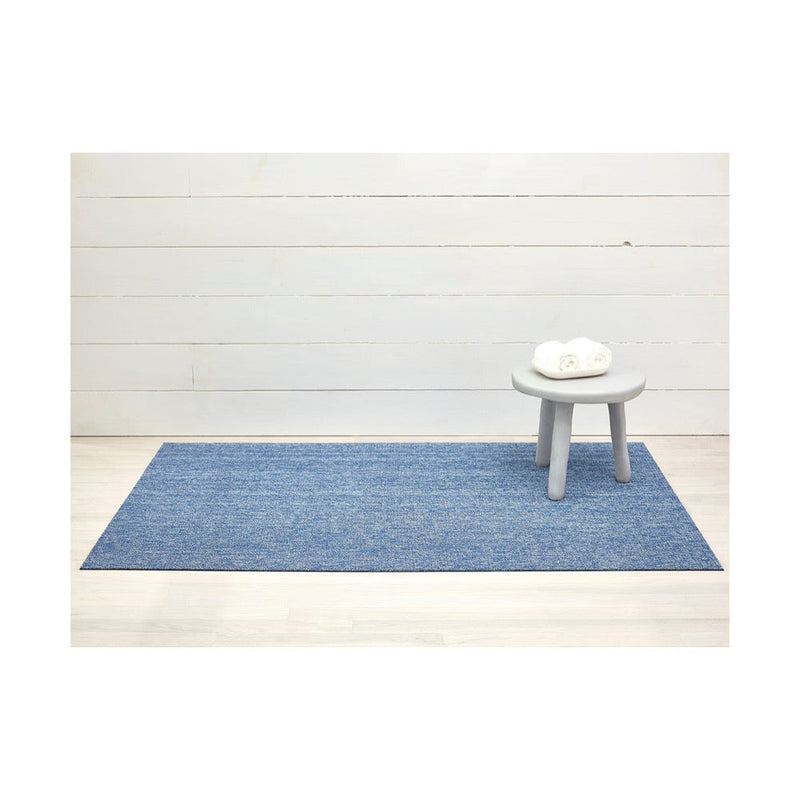 Chilewich Heathered Shag Doormat in Cornflower, featuring a subtle blush tone blend, ideal for indoor/outdoor use with slip-resistant vinyl backing.