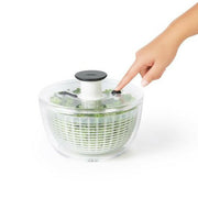 OXO Good Grips Salad Spinner features a soft, non-slip knob and doubles as a colander. Ideal for drying greens, with a non-slip base and built-in brake.