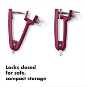 OXO Good Grips Cherry & Olive Pitter in Beet, featuring a non-slip grip, removable splatter shield, and locking mechanism for efficient and mess-free pitting.