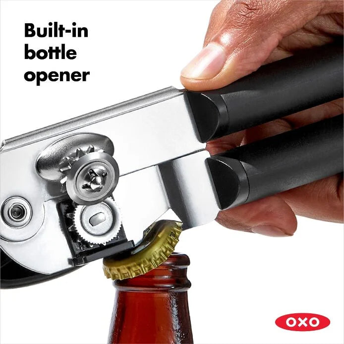 OXO Soft-Handled Can Opener held in hand, showcasing its ergonomic design and built-in bottle opener, emphasizing ease of use and versatility.