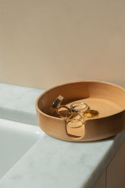 Graf Lantz | Kobon Leather Round Tray - Natural, featuring elegant Vachetta leather, organized with gold rings, perfect for holding jewelry and small essentials.