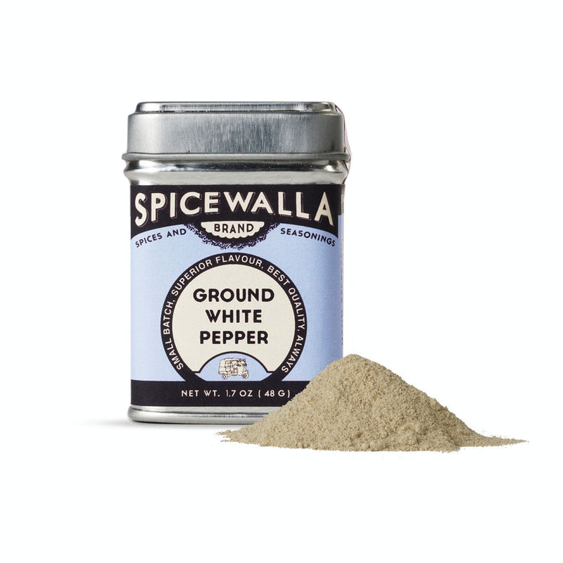 Spicewalla | Ground White Pepper tin and powder, offering mild heat and subtle aroma, ideal for diverse cuisines, available at Athens Cooks, a specialty kitchen store.