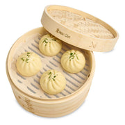 Helen's Asian Kitchen Silicone Steamer Liners in a wooden steamer with dim sum, showcasing their use for easy, mess-free steaming of various foods.
