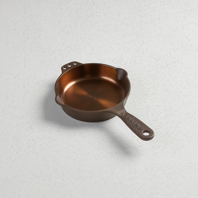 Smithey No. 6 cast iron skillet with polished interior and long handle