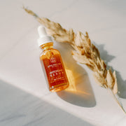 Little Seed Farm | Antioxidant Serum bottle showcasing a blend of botanical oils and CoQ10, designed to protect and revitalize skin against environmental stressors.