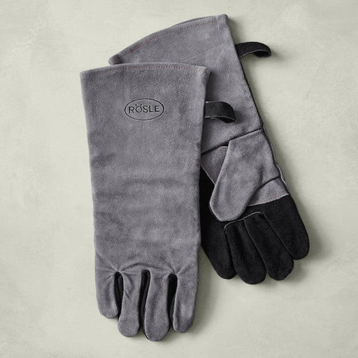 Rösle Premium Grill Gloves - Leather, featuring flame-retardant aramid fibers, silicone grip, leather reinforcement, and extra-long cuffs for heat protection up to 350°C.