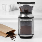 Cuisinart Supreme Grind Automatic Burr Mill with coffee beans, showcasing its sleek design and advanced grinding features for optimal coffee preparation.