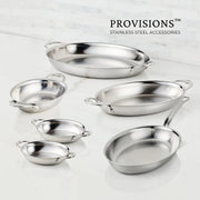 Hestan Provisions | Chef's Special Oval Clad Au Gratin dishes with loop handles, part of a stainless-steel collection, displayed on a countertop.