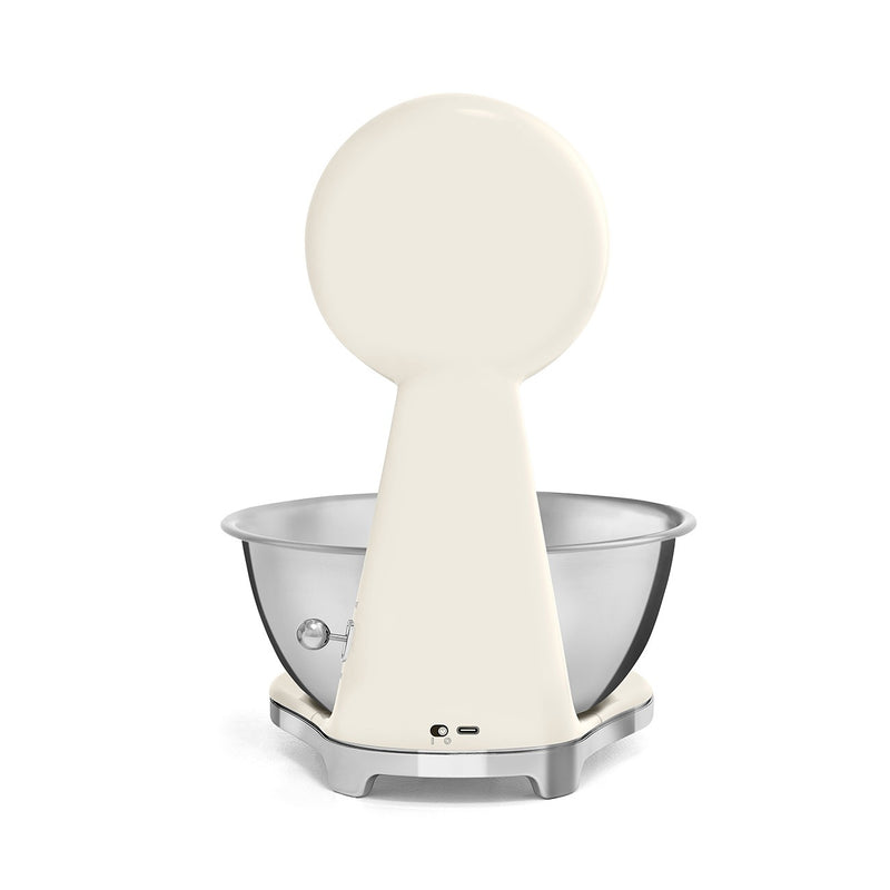 Smeg | Kitchen Scale's back view shows a stainless-steel bowl, USB-C port, and controls, highlighting its blend of design and cooking functionality.