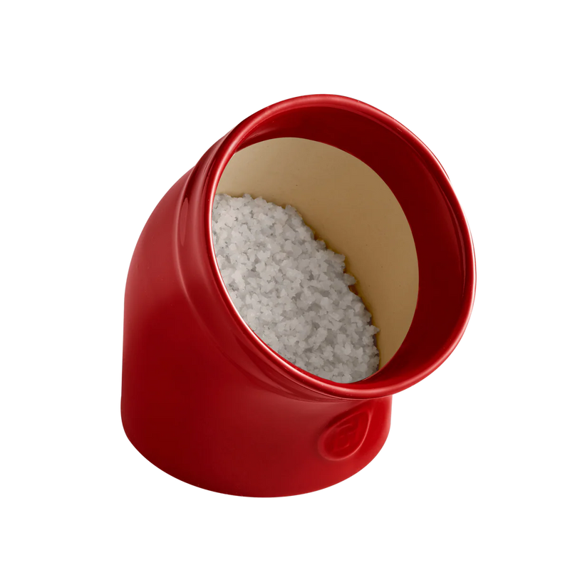Emile Henry | The Salt Pig filled with coarse sea salt, showcasing its classic design for easy seasoning access in your kitchen.