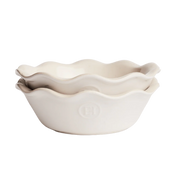 Emile Henry | Modern Classics Mini Pie Dish Set of 2, 5.5 x 1.5, featuring two nested cream ceramic dishes with scalloped rims, ideal for even pie baking.