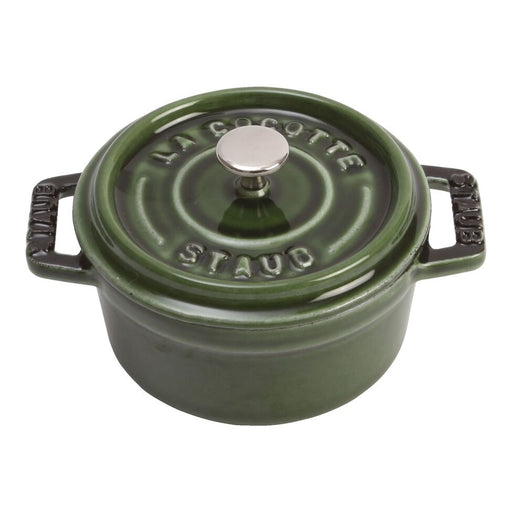 Staub | Mini Round Dutch Oven, Basil, 0.25 QT. A small, lidded cast-iron pot with handles, ideal for single-serve dishes like molten chocolate cake or French onion dip.