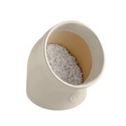 Emile Henry | The Salt Pig, an off-white ceramic pot, holds coarse white crystals, showcasing a practical, stylish design to keep salt accessible and free-flowing.