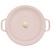 Staub | Round Dutch Oven, Pink Peony, 5.5 QT, featuring cast-iron handles, gold-tone knob, and LA COCOTTE STAUB lid lettering, ideal for versatile cooking.