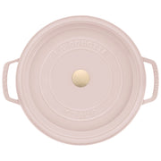 Staub | Round Dutch Oven, Pink Peony, 7 QT, featuring embossed lid and gold-tone knob, ideal for versatile cooking from Athens Cooks.