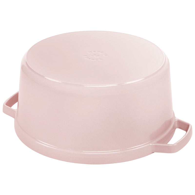 Staub Round Dutch Oven, Pink Peony, 7 QT, upside-down, showing side handles and Made in France 28 stamp, ideal for Athens Cooks' curated kitchen collection.