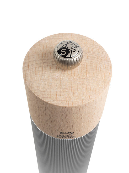 Peugeot | Line Salt Mill, Aluminum + Beechwood, Natural, 9 inches, features a ribbed metal base, smooth wooden top, and adjustable steel grinding mechanism. Ideal for dry salt crystals.