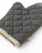 MagicLinen Linen Oven Mitts - Chocolate Brown are designed for heat protection with a quilted exterior and padding, ideal for cooking and baking in any kitchen.