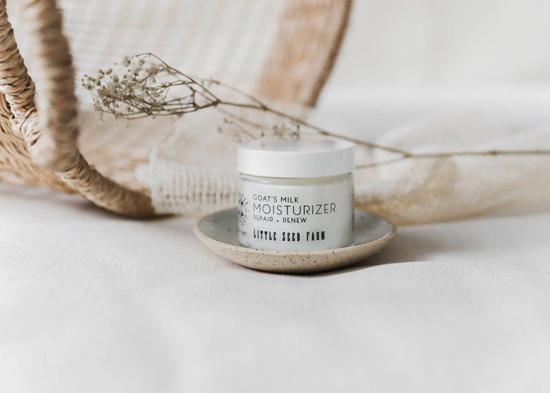 Little Seed Farm | Goat's Milk Moisturizer displayed in a sleek jar, emphasizing its nourishing ingredients like Argan Oil and Aloe for a matte, glowing complexion.